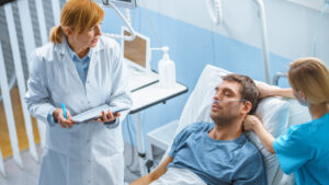 Doctor checking on patients condition.