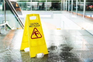 Caution sign for wet floor to avoid accident
